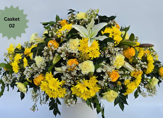 Casket funeral spray yellow