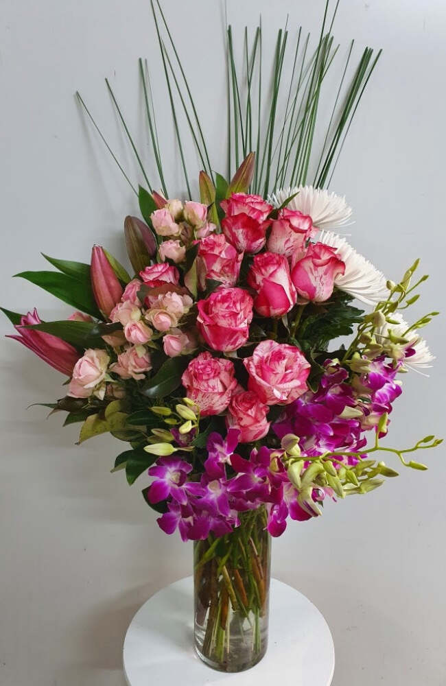 Fresh Flower Arrangement in a Large Glass Vase | Roses and Orchids | Fresh Flower Delivery Sunshine Coast | Coastal Flora